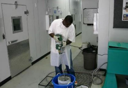 Man mixing chemicals